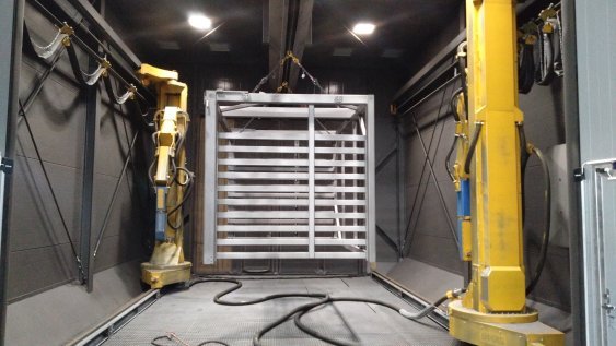 Blastman 16XS robots and the workpiece in the blasting chamber