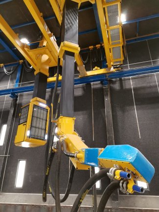 Automated blast cleaning robot with separet control cabin