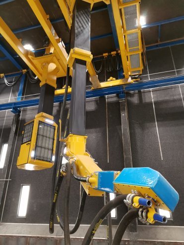 Abrasive blasting robot with separate control cabin 